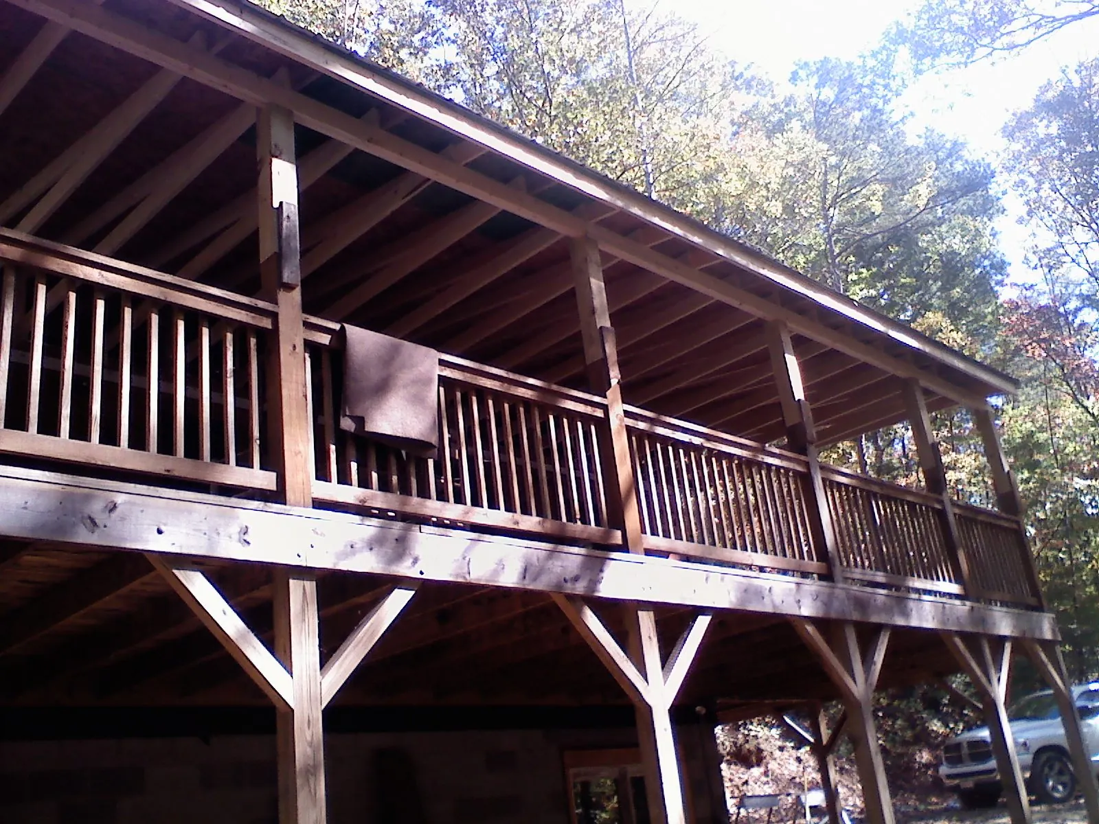 Timber framing under a new elevated porch and deck — Roof Leak Repair in Coshocton by Roofing Brothers